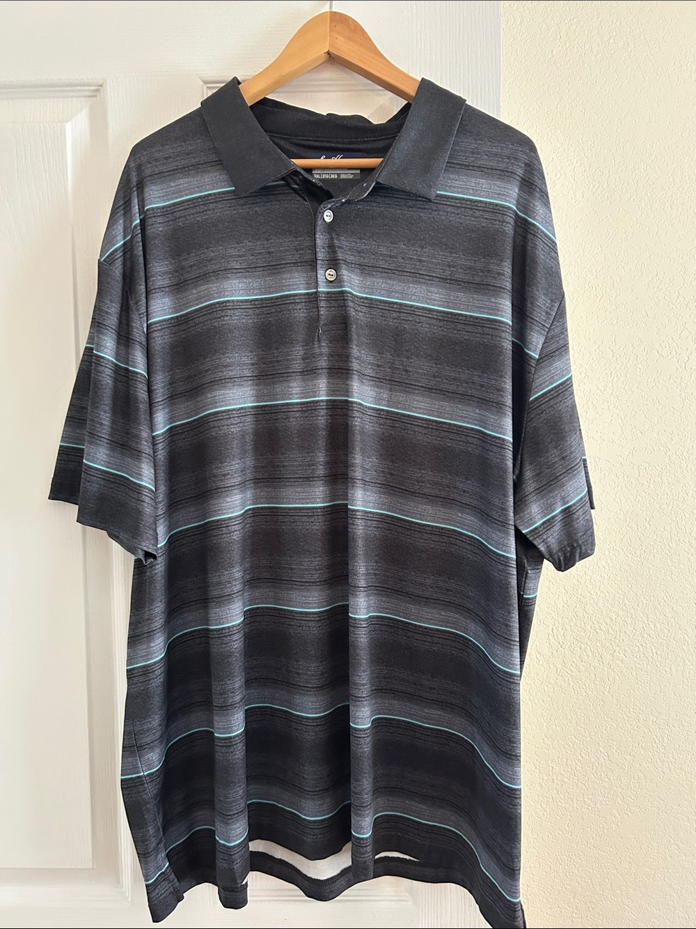 EUC - Ben Hogan Men's Black Striped Polo Shirt with Teal Accents